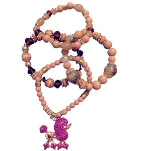 Who is ready for that pink poodle bling?🐶💎